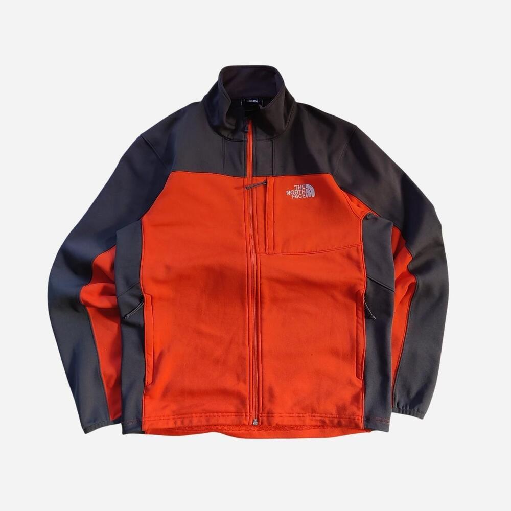 The North Face orange fleece jacket with embroidered details